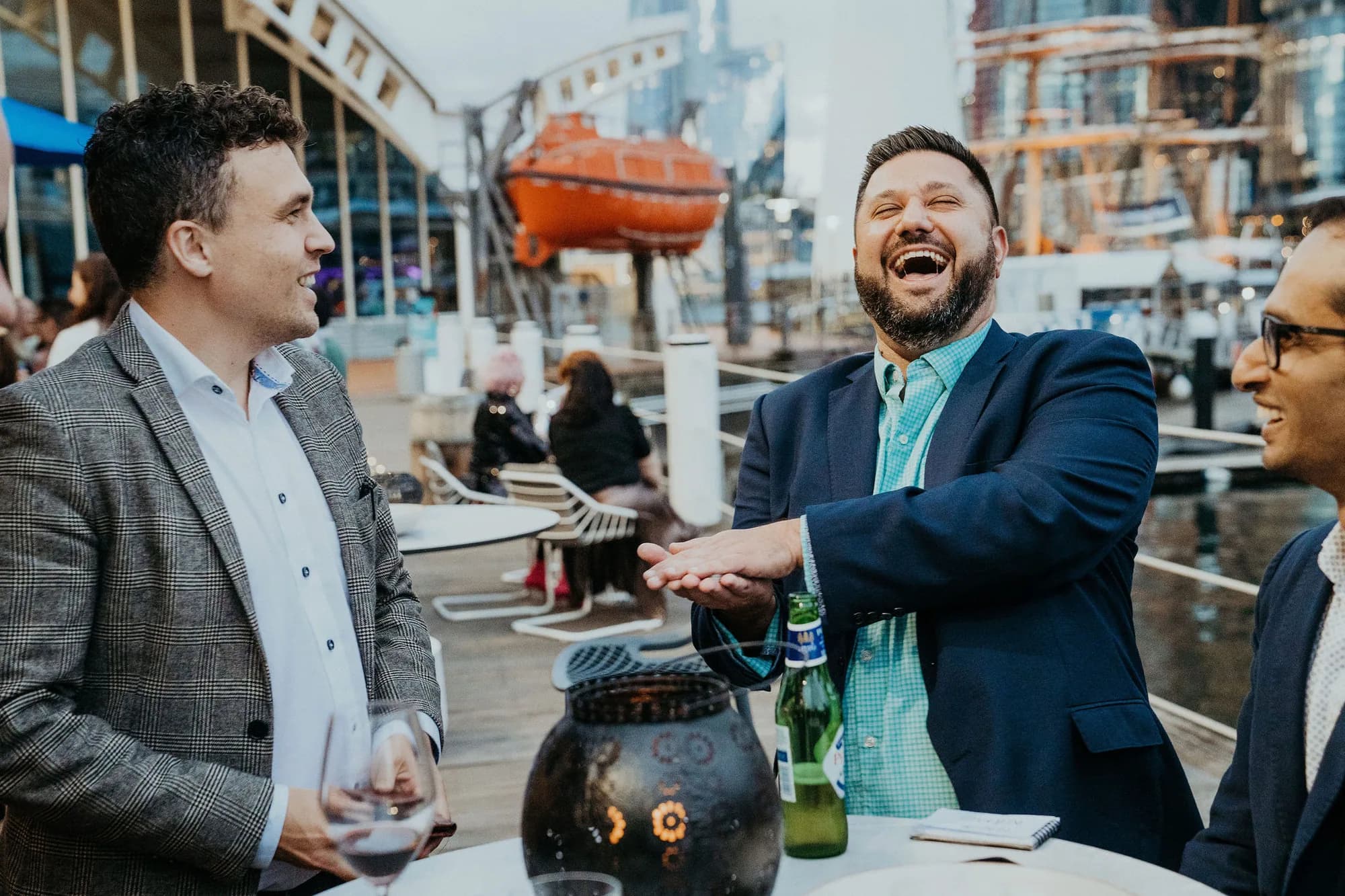 A guest laughing during Andy Nunn's close-up corporate entertainment