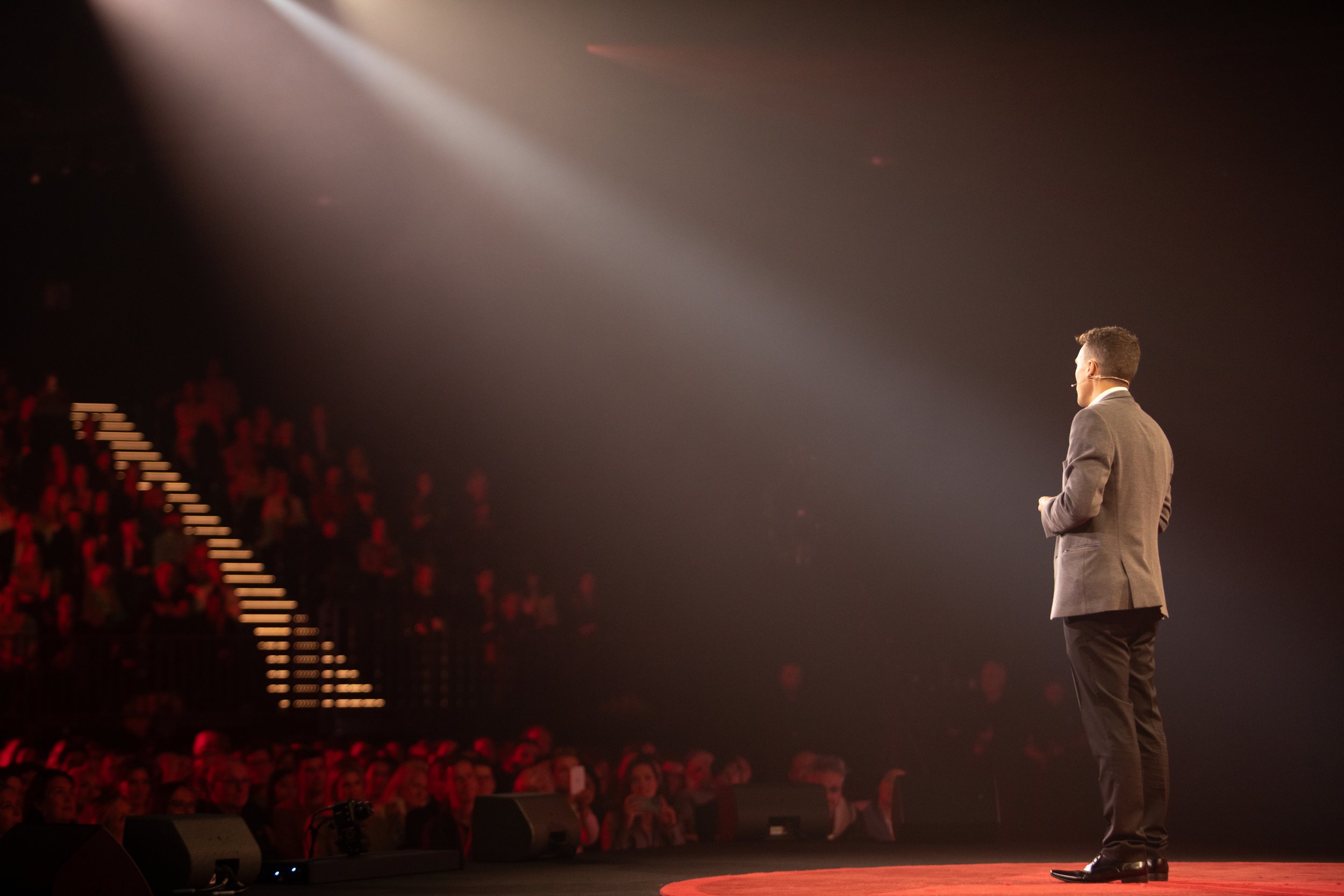 Andy Nunn delivering his TEDx talk on stage