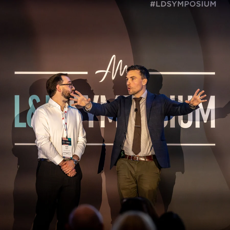 Andy Nunn leadership speaker Sydney explaining an idea with a participant during a keynote