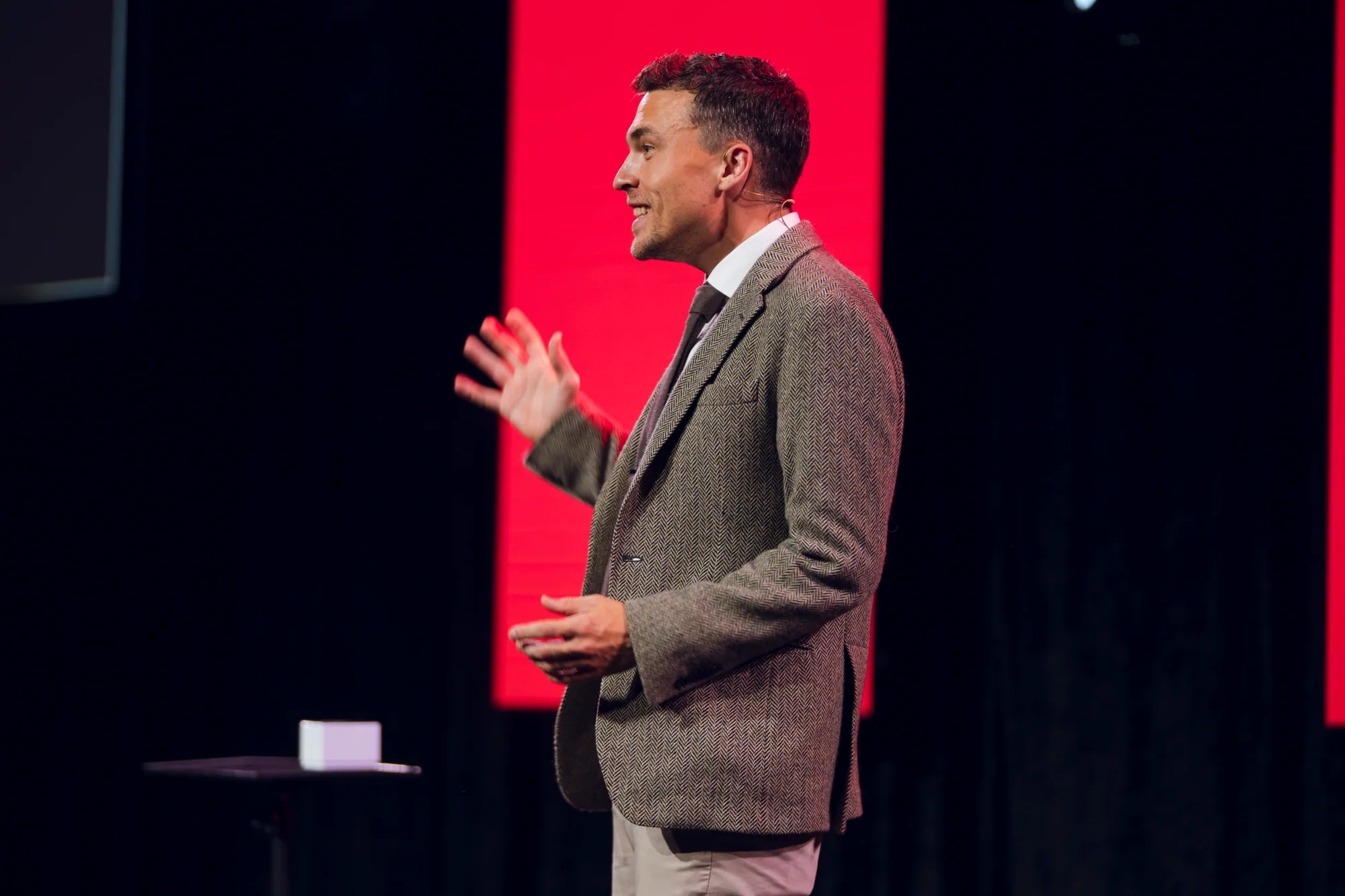 Andy Nunn speaking in profile at an Australian corporate event